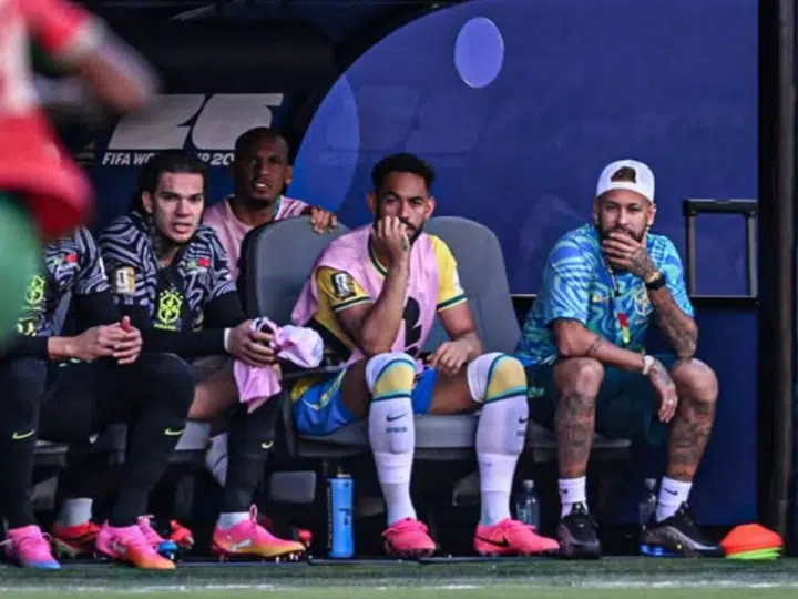 Neymar joins the Brazil team on the bench for their World Cup opener vs. Morocco