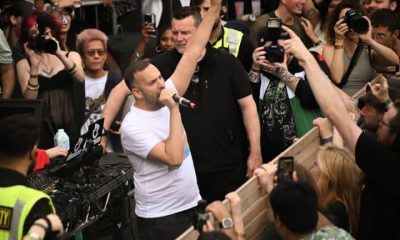 Green Party leader Zack Polanski on the mic
