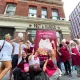 Campaigners outside Pret with a giant birthday card