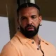 Who's That? Social Media Users Are Chattin' After Livestream Showed Drake With His Arm Around Mystery Woman (WATCH)