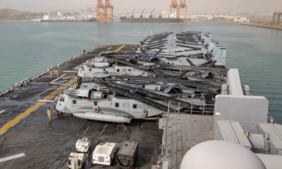 The U.S Navy Wasp-class amphibious assault ship USS Kearsarge arrives for a port visit in Salalah, Oman, on 8 March 2026. Iran is attacking US aircraft support bases.