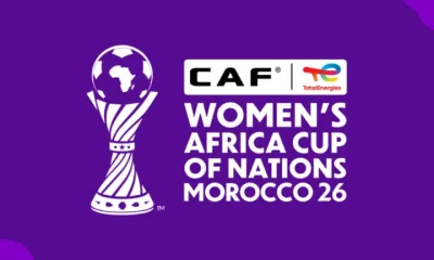 The CAF WAFCON logo of a footbal trophy with the name of the tournament alongside it