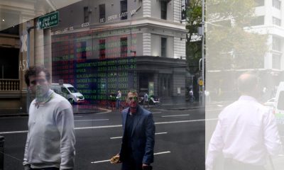 Banks and supermarkets drag Australian shares lower