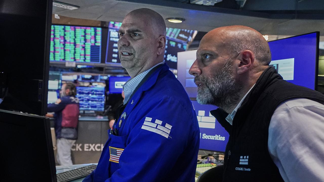 Dow hits record closing high after soft US jobs data