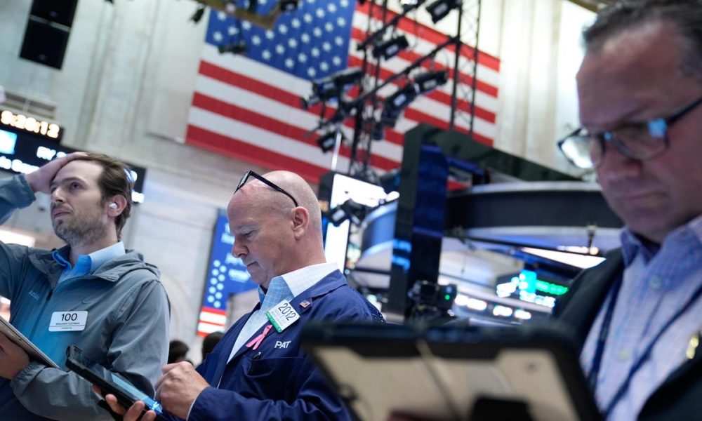 Wall Street closes higher as chip stocks rally