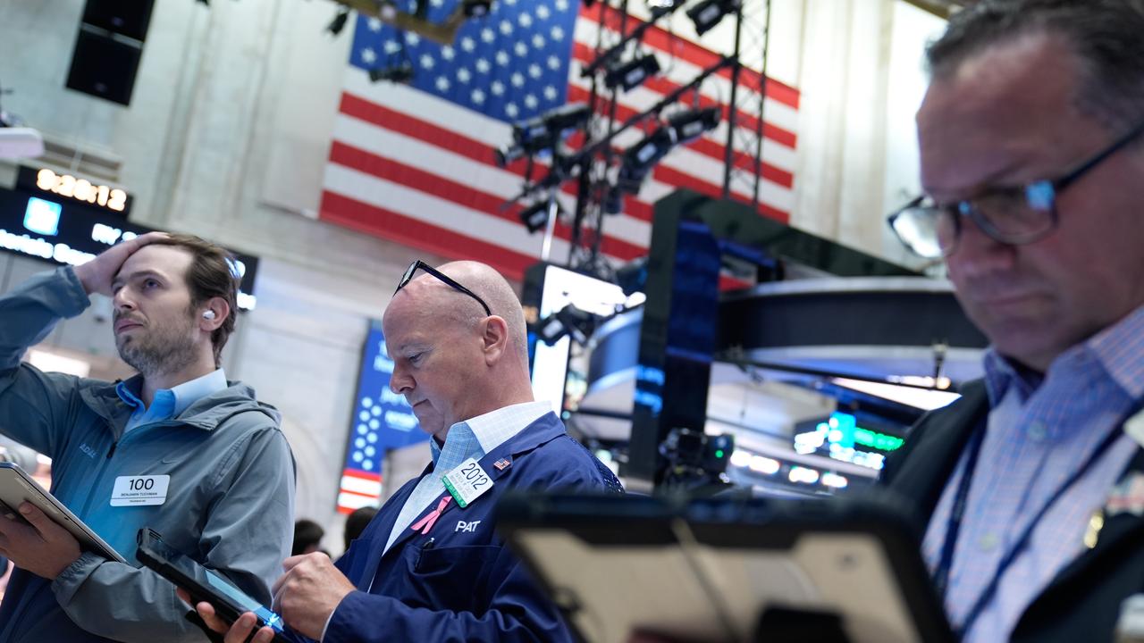 Wall Street closes higher as chip stocks rally