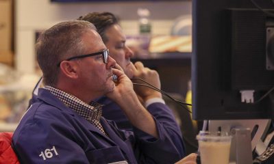 Wall Street ends higher as chip stocks bounce back