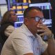 Wall Street ends higher on cool inflation data