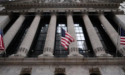 Wall Street closes down sharply after Fed holds rates