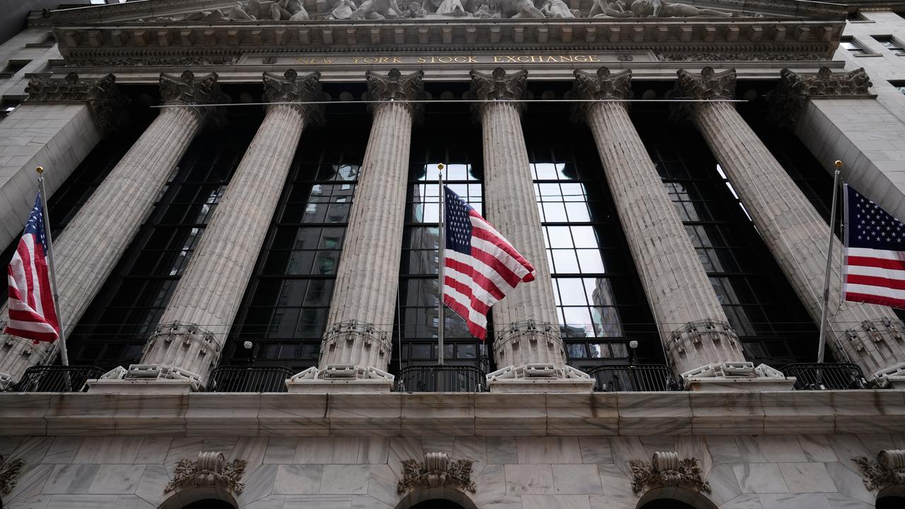 Wall Street closes down sharply after Fed holds rates