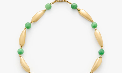 golden necklace with green beads