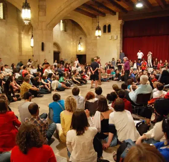Brazilian theater director and writer Augusto Boal presenting his Theatre of the Oppressed at Riverside Church in New York City. Source: Wikimedia.