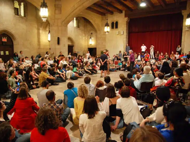 Brazilian theater director and writer Augusto Boal presenting his Theatre of the Oppressed at Riverside Church in New York City. Source: Wikimedia.