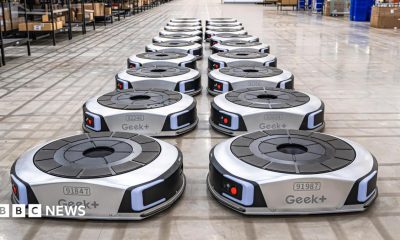 Geek+ floor robots lines up in a UK warehouse