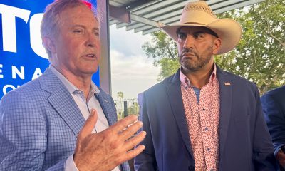 Ken Paxton talking to Tano Tijerina at campaign event in McAllen, Texas.