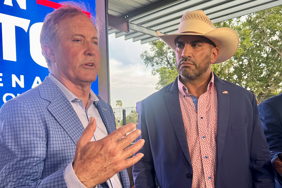 Ken Paxton talking to Tano Tijerina at campaign event in McAllen, Texas.