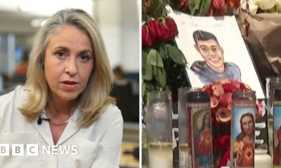 On the left, a TV presenter wearing a white shirt; on the right, a memorial.