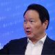 Chey Tae-won, chairman of SK Group, speaking during the company's initial public offering at the Nasdaq MarketSite in New York in July