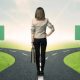 businesswoman stands at a crossroads and must make a decision