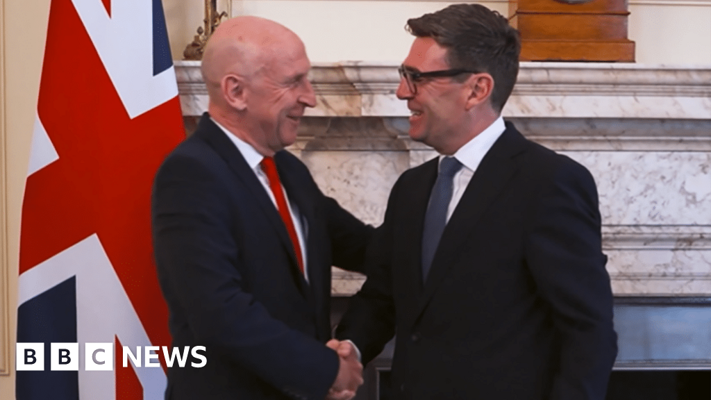 John Healey and Andy Burnham shake hands