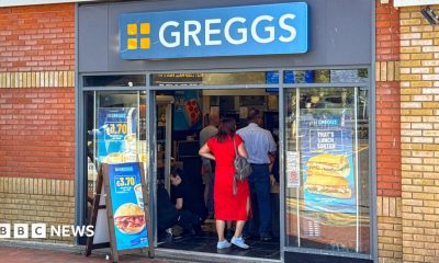 People queuing inside a Greggs