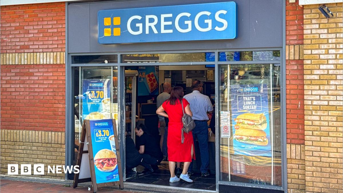 People queuing inside a Greggs