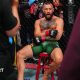Conor McGregor sits on a stool