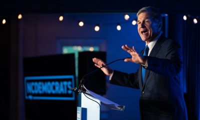 Then-North Carolina Gov. Roy Cooper speaks to the crowd during an event in May 17, 2022, in Raleigh.