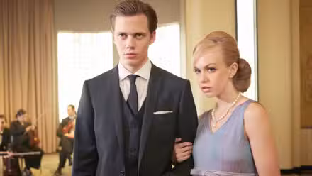 Letha holding on to Roman's arm