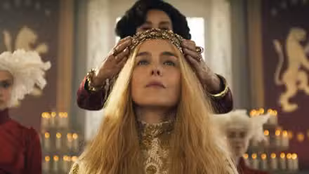 A lady being crowned during a royal ceremony in The Wheel of Time