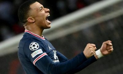 Kylian Mbappe celebrates after scoring PSG's late winner against Real Madrid