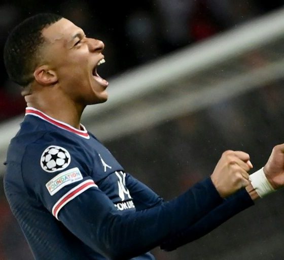 Kylian Mbappe celebrates after scoring PSG's late winner against Real Madrid