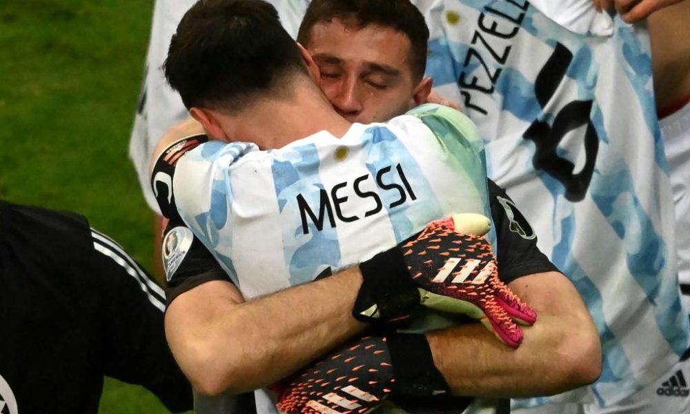 Lionel Messi celebrates with goalkeeeper Emiliano Martinez whose three penalty shoot-out saves sent Argentina into the Copa America final