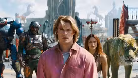 Idris Elba as Man at Arms, Nicholas Galitzine as Prince Adam, and Camila Mendes as Teela in Masters of the Universe.