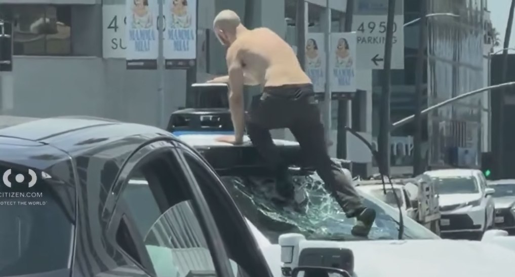 Shirtless Man Arrested After Vandalizing Waymo, Halting Traffic in Busy