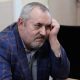 A Putin critic is convicted on charges that stop him from campaigning for parliament