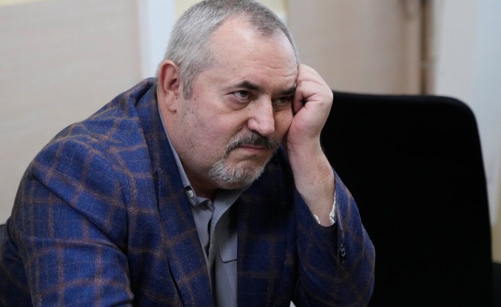 A Putin critic is convicted on charges that stop him from campaigning for parliament