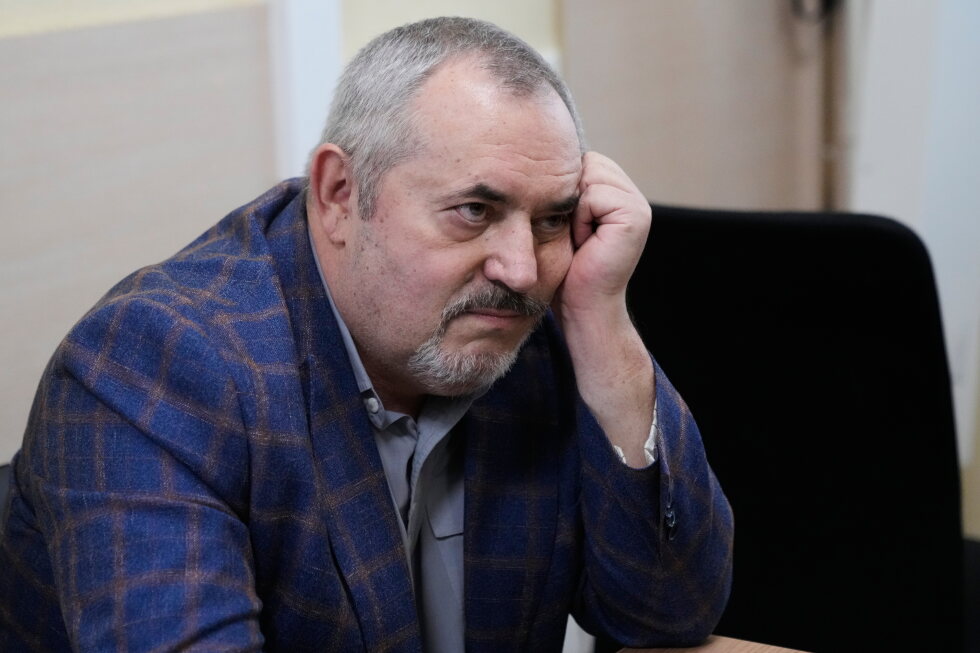 A Putin critic is convicted on charges that stop him from campaigning for parliament