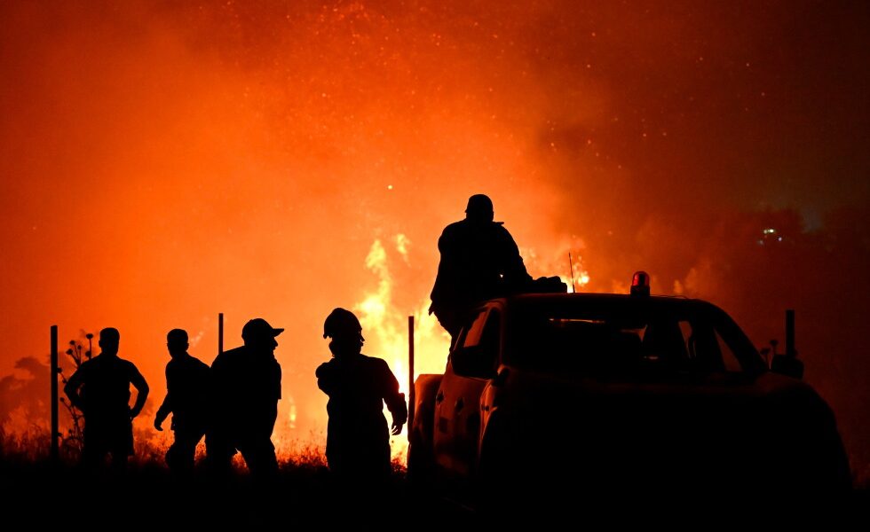 Firefighters battle wildfires in Portugal and Greece