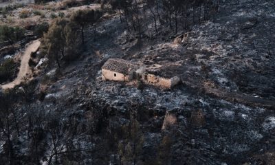 Firefighters and helicopters battle deadly wildfires in Spain