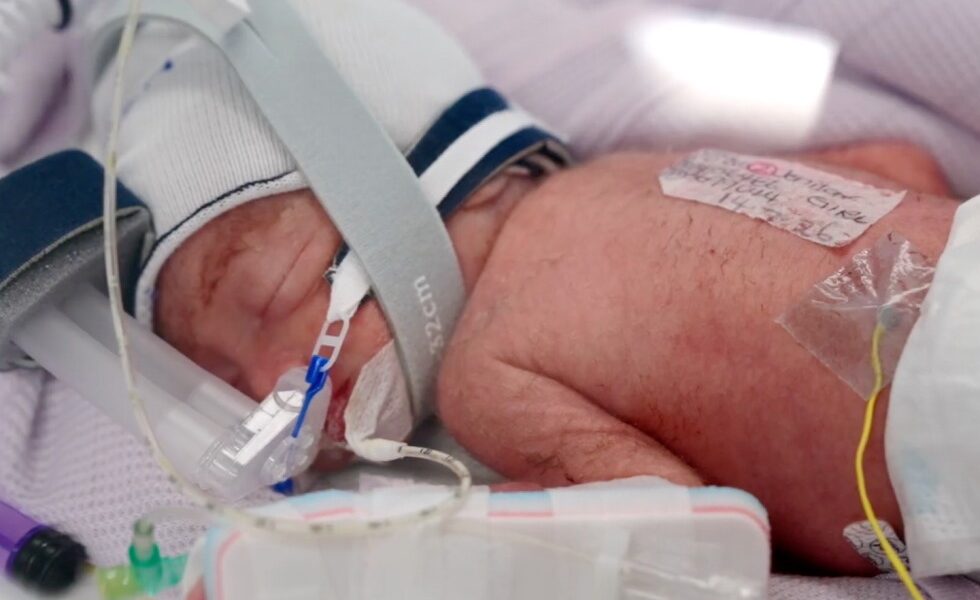 Australian woman gives birth to identical quadruplet girls