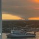 New Forest fire seen from Portsmouth with the Spinnaker Tower and ferry in the foreground.