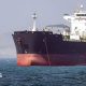 In this picture obtained from Iran's ISNA news agency and taken on May 2, 2026, the Gambia-flagged tanker vessel Bili is pictured anchored in the Strait of Hormuz off Bandar Abbas in southern Iran.