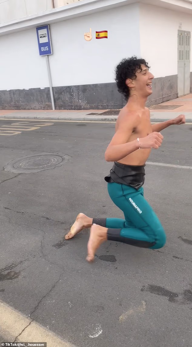 One viral video from Ceuta shows a young boy kneeling with his wetsuit peeled half off and punching the air in triumph