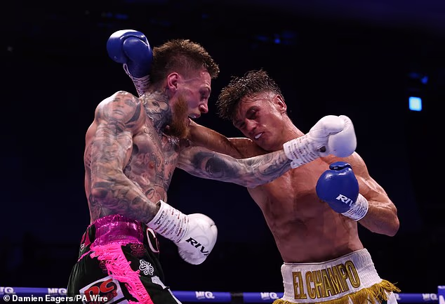 Lee Reeves (right) was rushed to hospital after being knocked out by Gary Cully on Saturday