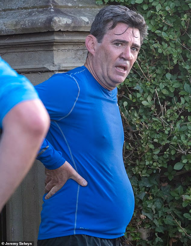 Andy Burnham pictured on a run in Manchester yesterday. Swingeing workers' rights changes will make it easier for unions to ballot for strikes