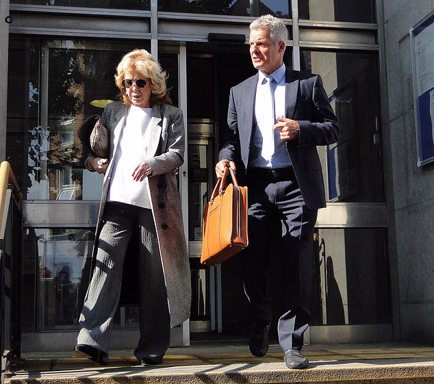 Lynda La Plante and her lawyer Nick Freeman, known as 'Mr Loophole', leave Lavender Hill Magistrates' Court in London today