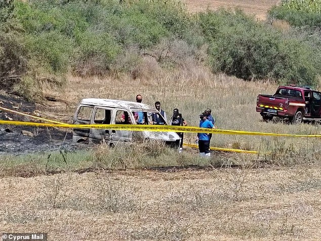 The white car (pictured) is believed to have become stuck in the mud, after the pensioner, accompanied by his care worker, got lost - before it set alight