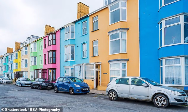 Nuisance: A reader is fed up with beachgoers parking outside their house during the summer months  and wants to know if it is legal to put up a no parking sign (file picture)