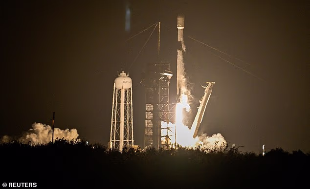 One of Elon Musk's discarded SpaceX rockets has crashed into the moon. Pictured: The rocket launching in January 2025, from Kennedy Space Centre in Florida